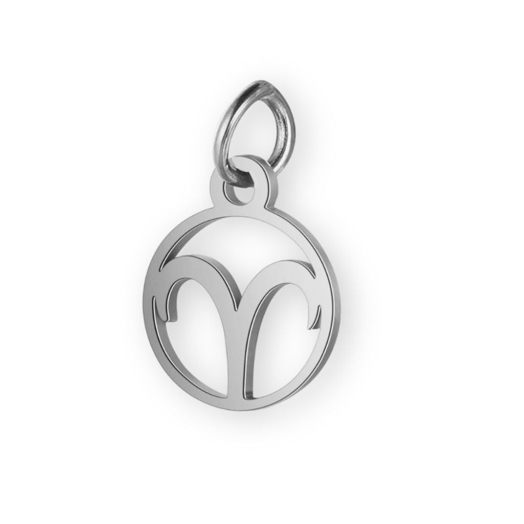 Un pendentif en argent pour bola de grossesse de femme enceinte représentant le signe astrologique du bélier