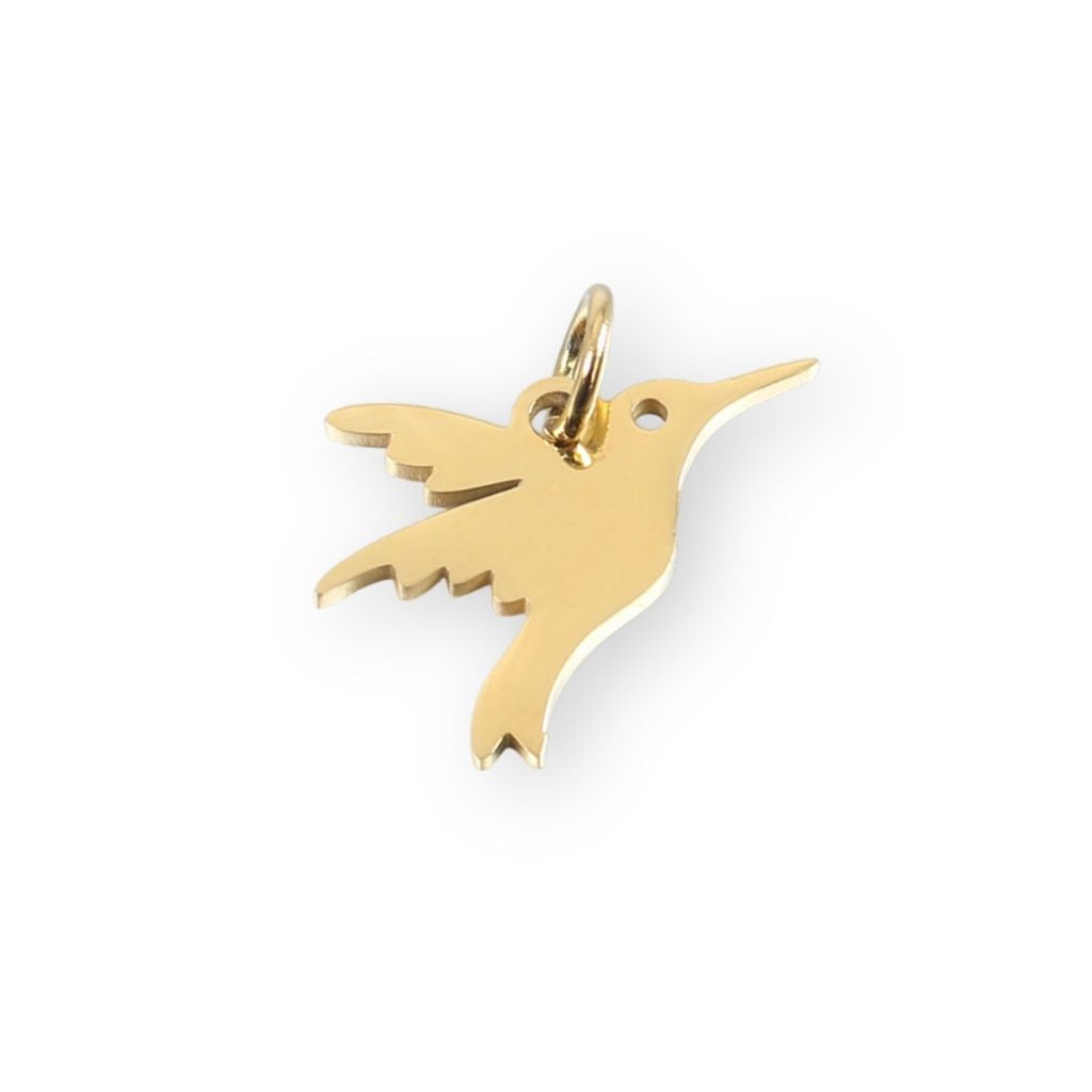 Une collection de pendentif colibri en or pour bola de grossesse de femme enceinte