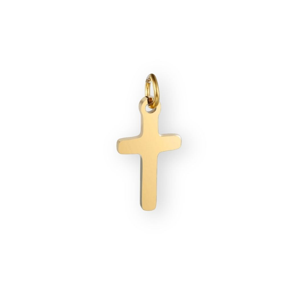 Une collection de pendentif croix en or pour bola de grossesse de femme enceinte