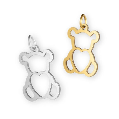 Une collection de pendentif nounours en argent et en or pour bola de grossesse de femme enceinte