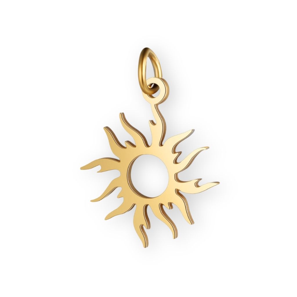 Une collection de pendentif soleil en or pour bola de grossesse de femme enceinte